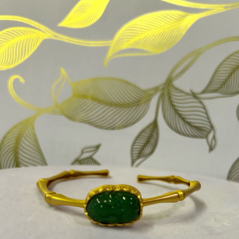 Elegant Gold and Green Bracelet